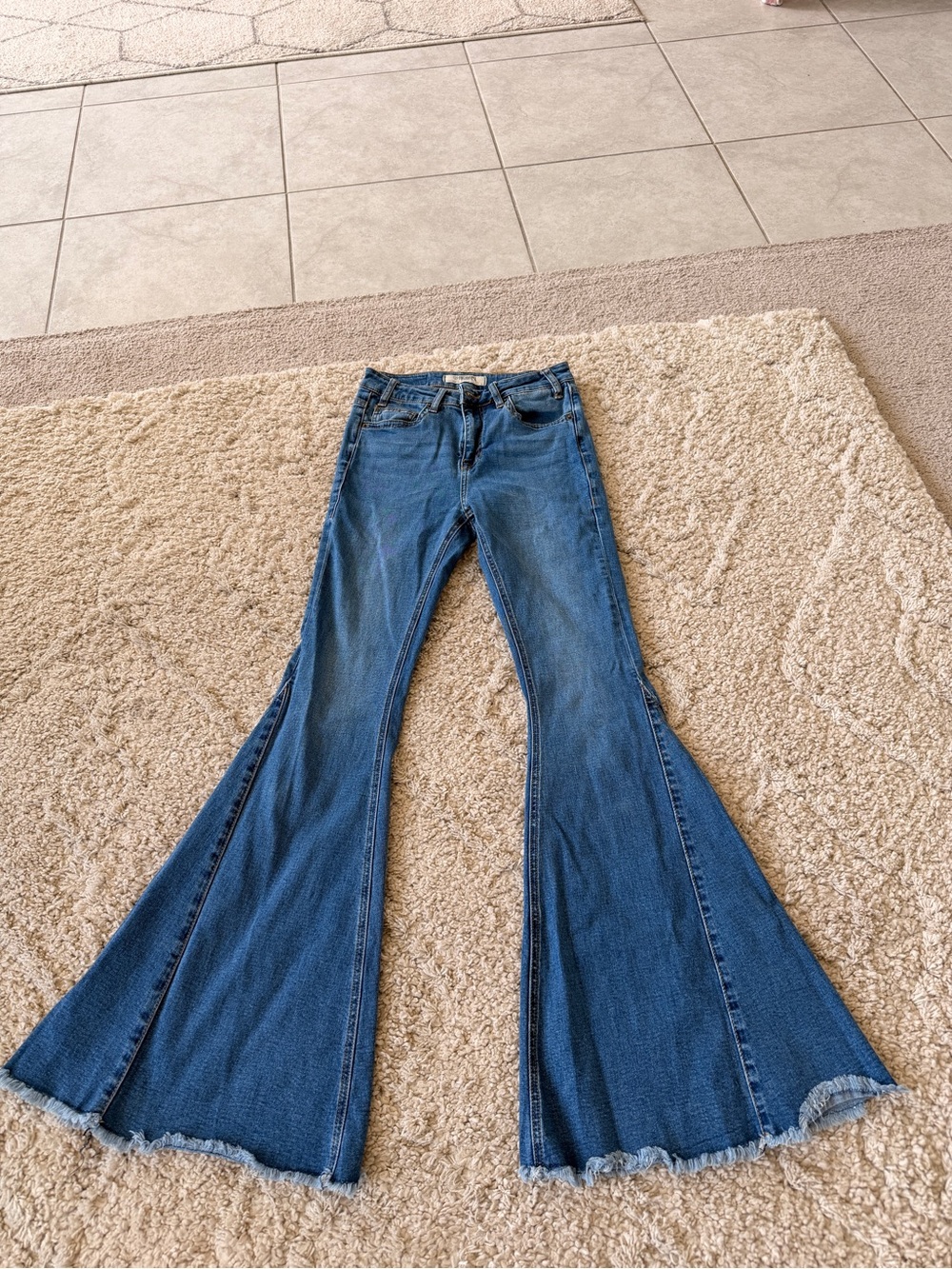 Blue High-Rise Flare Jeans with Frayed Hem